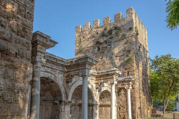 The Arch of ancient times. The famous gate, built in honor of the ancient Roman emperor. The Arc de Triomphe in the Kaleici area. Hadrian's Gate in Antalya. The arch is decorated with carved patterns.
