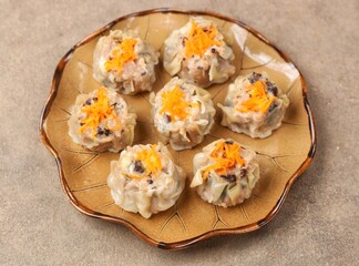 Siomai, Siomay, Shumai or Shumay is a type of dimsum which is a traditional Chinese food.