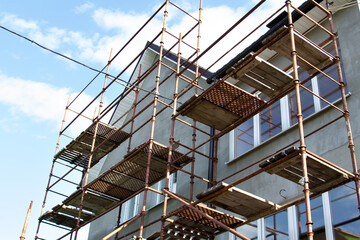 Roof repair of a private residential building. Roof with sheathing for subsequent covering with iron tiles