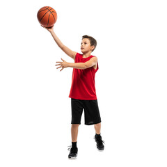 young boy playing basketball