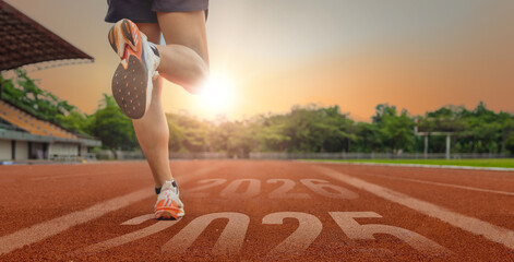 Athlete Sprinting on Track Towards New Year Goals