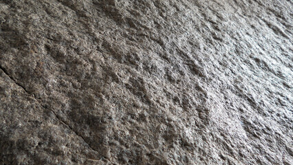 Rough surface of huge rock in closeup