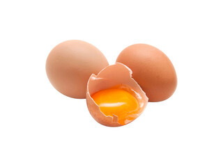 Three fresh, raw eggs and a broken egg with yolk and shell isolated on a white background