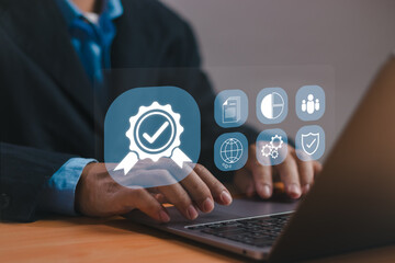 Concept of quality control, certification, quality assurance, service guarantee, Man working on laptop show management according to standard or business process requirements with virtual infographic
