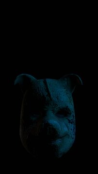Creepy Seamless vertical video of a horror psycho butcher mask with color strobe lights. Halloween background of a terror killer character with copyspace