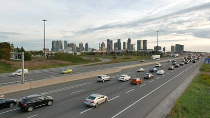 Looking west down highway 403 in downtown Mississauga, Ontario, Canada during evening rush hour. 2016.