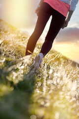 Walking and enjoying the sunset in the beautiful meadow landscape, healthy lifestyle and health care concept