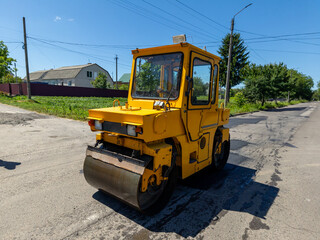 Yellow rink rolled asphalt on the road, road repair