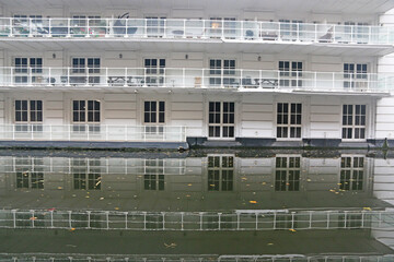 Building reflected in a canal