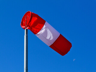 Red and white professional windsock or windbag. wind direction indicator. durable nylon textile...