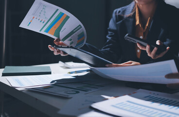 Two business people analyzing the data