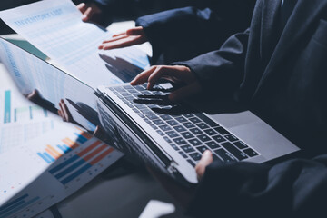 Two business people analyzing the data