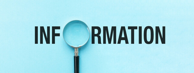 A magnifying glass is on a blue background with the word Information written bel