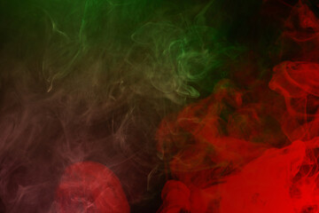 Green and pink steam on a black background.