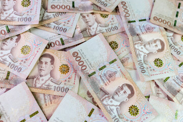 money banknote thai baht for background, pile of one thousand thai baht banknotes, savings money and financial business concept