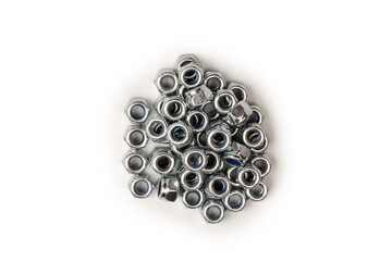 A group of metal nuts isolated on a white background.