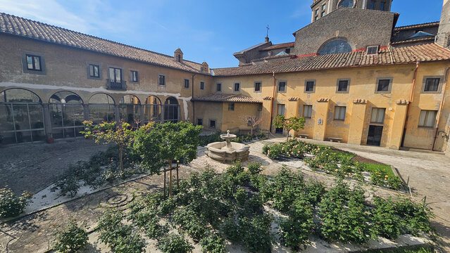 Cloister Garden with Fountain and Rose Bushes