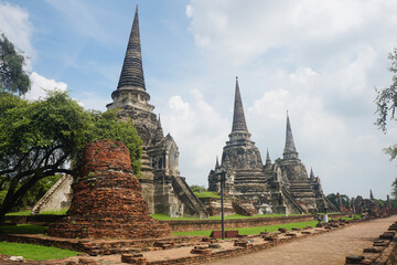 Wat Phra Si Sanphet Chedi and Wihan Ruins. The temple is graced by the landmark three bell-shaped main stupas standing side by side in a line. UNESCO World Heritage Site of Thailand.
