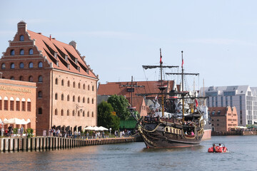 Galleon cruise ship on Motlava River next to  Baltic Philharmonic on Granary Island in Gdansk,...
