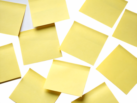 Scattered yellow sticky notes on a dark background isolated on a transparent background paper reminder