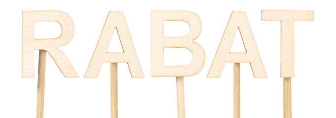 Rabat, the capital of Morocco, formed with wooden letters on a white surface, a clean image perfect for representing North African culture and destinations. Moroccan capital