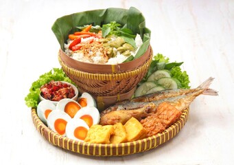 Nasi Liwet Sunda. Sundanese liwet rice is a rice dish cooked in a special way using various spices and herbs.