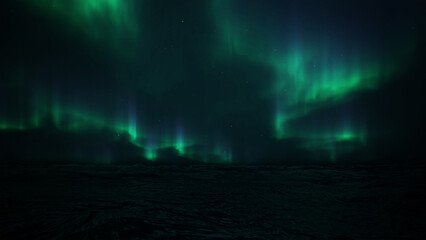 Northern Lights Over Dark Ocean at Night