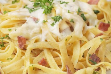 Fettuccine carbonara is a creamy pasta sauce made from a mixture of cream, cheese, and eggs.