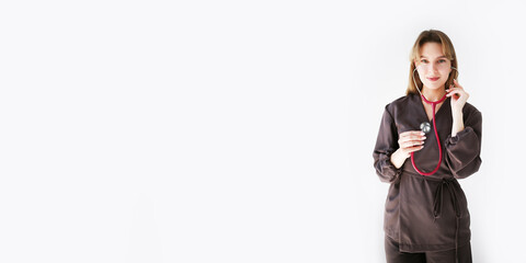 Wide banner image of a female doctor in dark uniform with a red stethoscope on white background. Medical professional with copy space for healthcare or clinic design.