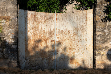 old rusty metal door south France