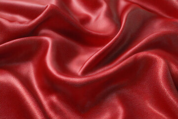 Obraz premium Rich red silk draped fabric texture