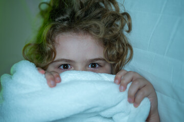 Child sleeping in a bed. Cute kid sleep. Kids pillow and blanket for sleeping. Little boy sleeps....