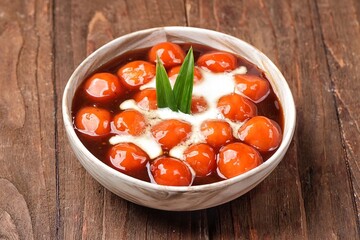 Biji Salak. Salak seeds are a ball-shaped snack made from a mixture of starch and sweet potatoes