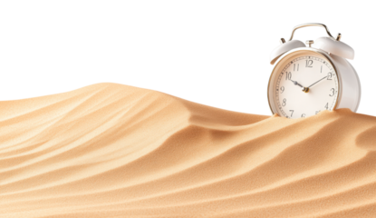 A vintage white alarm clock rests on smooth, rippled sand dunes against a black background.