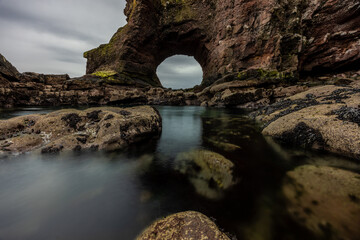 Maw Skelly Natural Sea Arch, Auchmithie Cliffs , Arbroath, Scotland