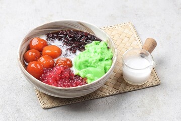 Bubur Madura atau Bubur Campur. Madura porridge is porridge with a sweet taste that contains a mixture of several sweet porridges
