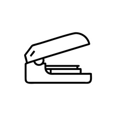 A stapler with open top on a office equipment stationery tool