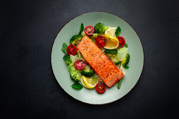 grilled salmon fillet, with vegetables, broccoli, cherry, iceberg lettuce, spices and herbs, homemade, no people,