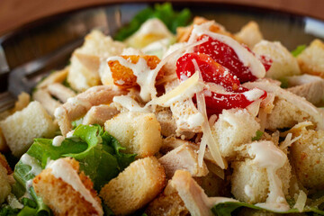 classic Caesar salad, close-up, natural light, selective focus, horizontal,