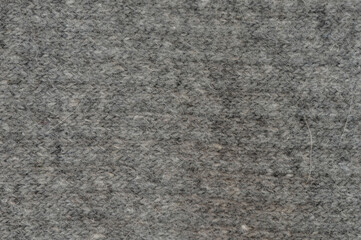Soft gray textured fabric ideal for upholstery or crafting projects in indoor settings