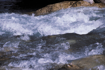 water flowing in the mountains