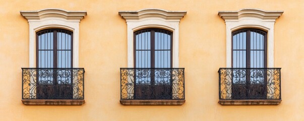 Three Arched Windows With Ornate Balconies on Orange Wall, Architecture , Exterior