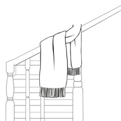 A woollen scarf on a stair rail