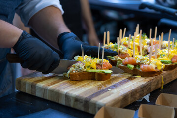 Cooking delicious appetizers with fresh ingredients in a bustling kitchen