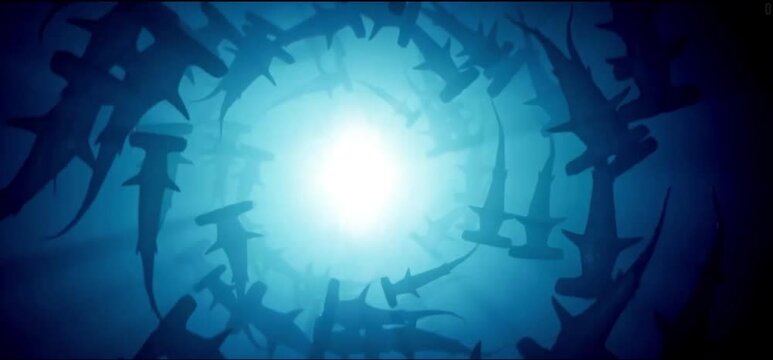 A vibrant blue underwater scene with a bright light at its center. Silhouettes of numerous hammerhead sharks swim around the light, creating a swirling tunnel effect.

