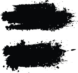 Black brush strokes and ink drops on white canvas