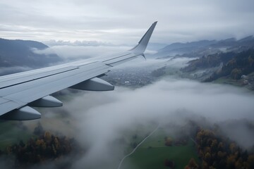 Obraz premium Flying above the misty valleys and mountains of Switzerland during an overcast day, Flying through mist over Switzerland valley and mountains