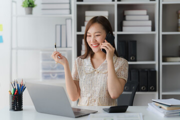 Modern Professional's Delight: An attractive professional is shown in an office environment working...