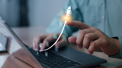A glowing arrow graph showing upward growth projection being touched on screen, indicating success,...
