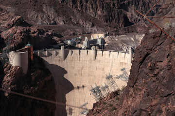 A close-up view of the dam. The photo clearly shows the high voltage electrical poles